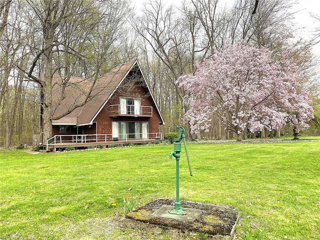1476 Grange Hall Rd, Junius, NY 14532 - view of front facade featuring a wooden deck, a front yard, and a chimney