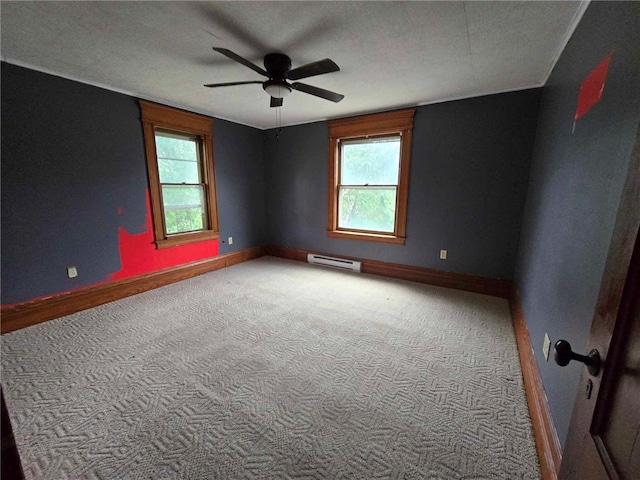 32 Vermont St, Bath, NY 14810 - carpeted spare room featuring baseboard heating, plenty of natural light, ceiling fan, and baseboards