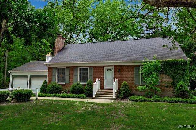 131 Idlewood Dr, Aurora, NY 14127 - view of front of home with a garage, a chimney, brick siding, and a front yard