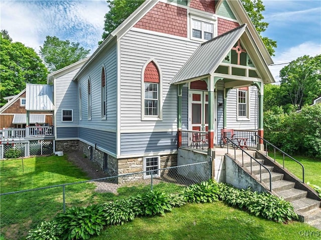 28 Bridge St, Albion, NY 13302 - view of front of property featuring a porch