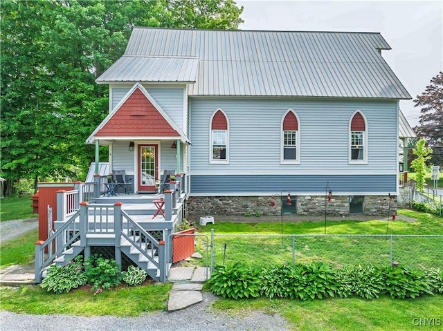 28 Bridge St, Albion, NY 13302 - view of front of house with a porch and metal roof
