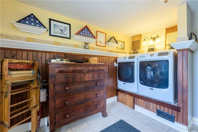 28 Bridge St, Albion, NY 13302 - laundry room featuring washer and dryer and light tile patterned floors