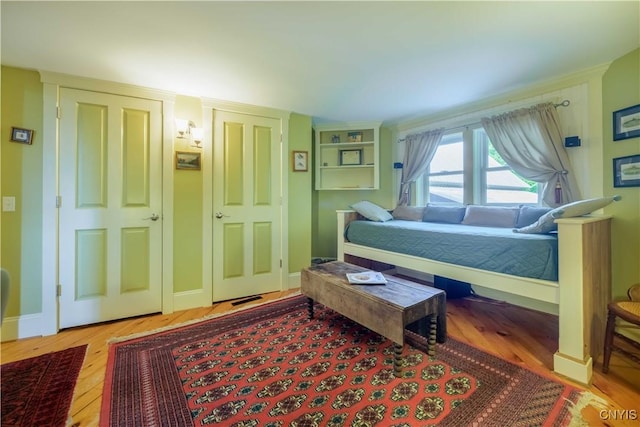 28 Bridge St, Albion, NY 13302 - bedroom featuring wood finished floors and baseboards