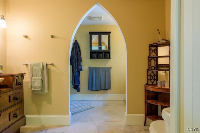 28 Bridge St, Albion, NY 13302 - bathroom with baseboards, toilet, and vanity