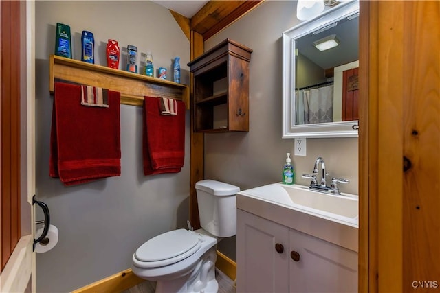 28 Bridge St, Albion, NY 13302 - bathroom featuring vanity, toilet, and baseboards