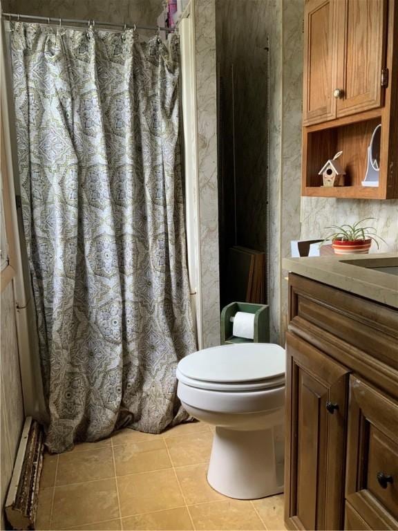 33 Hardy Hill Rd, Andover, NY 14806 - bathroom with vanity, tile patterned flooring, toilet, and a shower with curtain