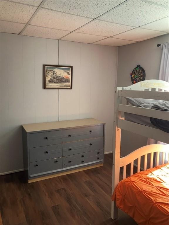 33 Hardy Hill Rd, Andover, NY 14806 - bedroom featuring dark wood-style floors, a paneled ceiling, and a decorative wall