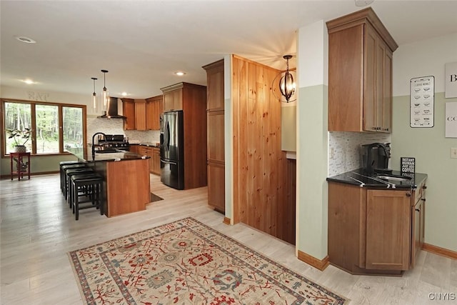 3485 Oran Delphi Rd, Pompey, NY 13104 - kitchen featuring wall chimney exhaust hood, refrigerator with ice dispenser, dark countertops, tasteful backsplash, and recessed lighting