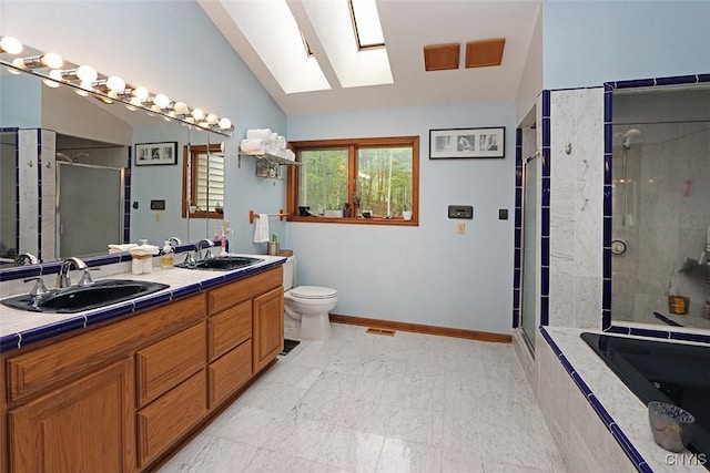 3485 Oran Delphi Rd, Pompey, NY 13104 - full bath featuring a stall shower, double vanity, lofted ceiling, baseboards, and tiled bath