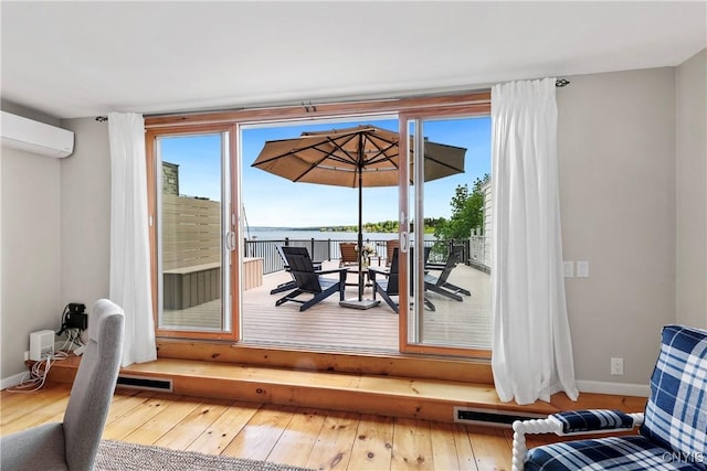 18 E Genesee St Unit 1, Skaneateles, NY 13152 - interior space with an AC wall unit and outdoor dining space