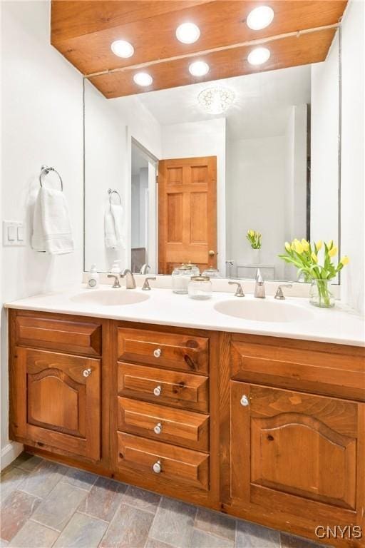 18 E Genesee St Unit 1, Skaneateles, NY 13152 - full bath featuring double vanity, recessed lighting, and stone finish flooring