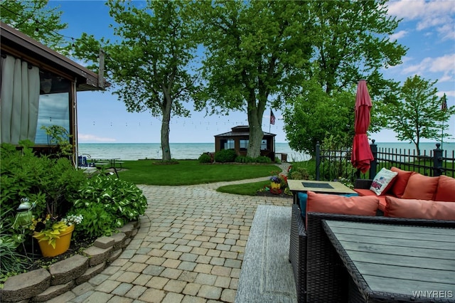 12383 Lake Forest Ln Unit 42, Yates, NY 14098 - view of patio / terrace featuring a water view and an outdoor hangout area