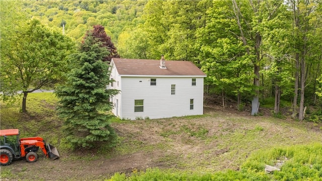 10610 State Route 7, Worcester, NY 12149 - view of side of property featuring a forest view