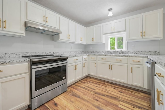 10610 State Route 7, Worcester, NY 12149 - kitchen featuring stainless steel appliances, under cabinet range hood, white cabinets, and a sink