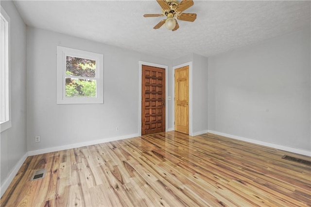 10610 State Route 7, Worcester, NY 12149 - empty room featuring wood finished floors, baseboards, and a ceiling fan