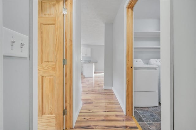 10610 State Route 7, Worcester, NY 12149 - corridor featuring washer and clothes dryer and wood finished floors