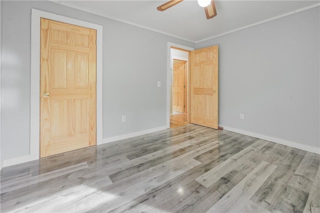 10610 State Route 7, Worcester, NY 12149 - unfurnished bedroom with wood finished floors, baseboards, ornamental molding, and a ceiling fan