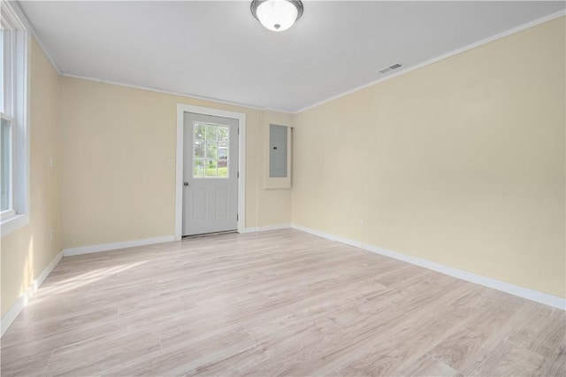 10610 State Route 7, Worcester, NY 12149 - unfurnished room featuring electric panel, light wood-style floors, ornamental molding, and baseboards