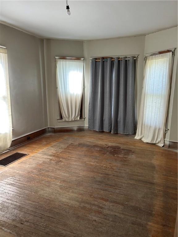 1227 Lake St, Elmira-City, NY 14901 - unfurnished room with plenty of natural light, wood finished floors, and baseboards