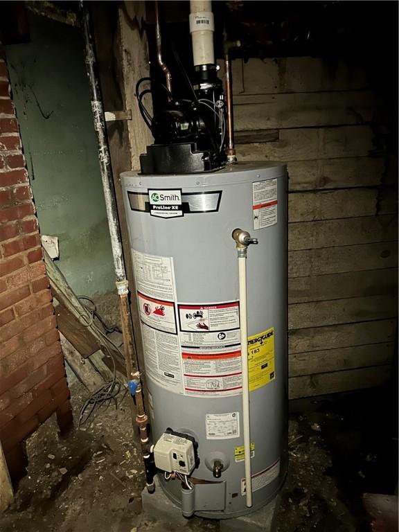 1227 Lake St, Elmira-City, NY 14901 - utility room featuring water heater
