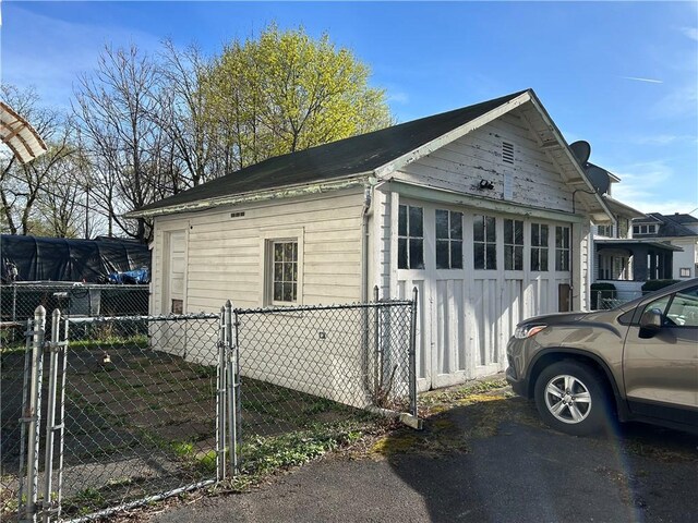 1227 Lake St, Elmira-City, NY 14901 - view of property exterior featuring an outbuilding and a gate