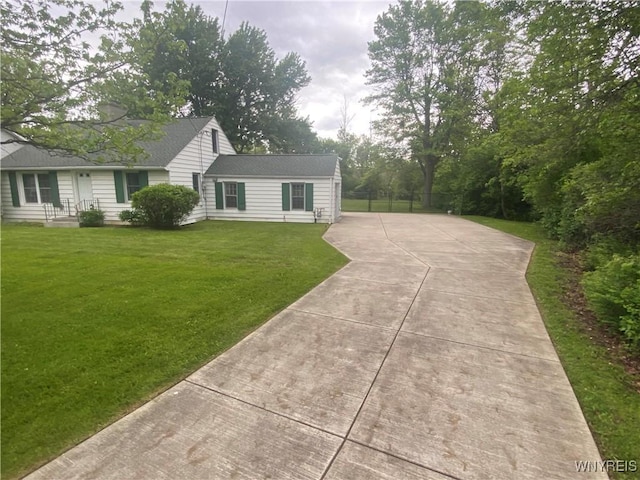 5780 Sheridan Dr, Amherst, NY 14221 - view of front of property with a front lawn and driveway