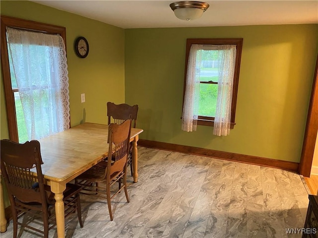 5780 Sheridan Dr, Amherst, NY 14221 - dining area with baseboards