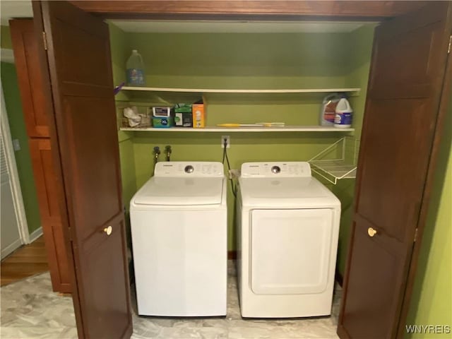 5780 Sheridan Dr, Amherst, NY 14221 - laundry room featuring washer and clothes dryer