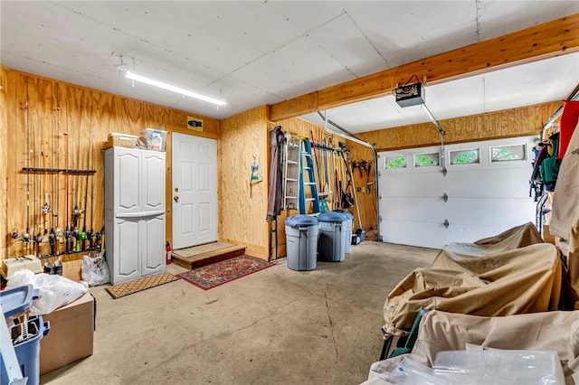 2555 County Highway 22, Richfield, NY 13439 - garage with wood walls and a garage door opener