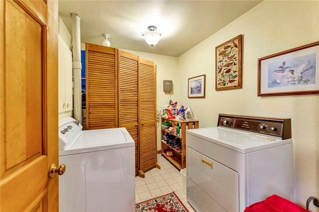 2555 County Highway 22, Richfield, NY 13439 - laundry room featuring washing machine and clothes dryer and light tile patterned flooring