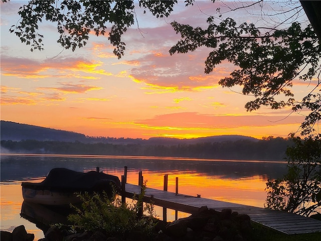 2555 County Highway 22, Richfield, NY 13439 - water view with a mountain backdrop and a dock
