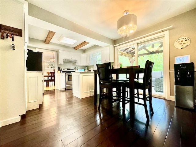 7 Overbrook Dr, Owego, NY 13732 - dining space with beam ceiling, dark wood-style flooring, a chandelier, and baseboards