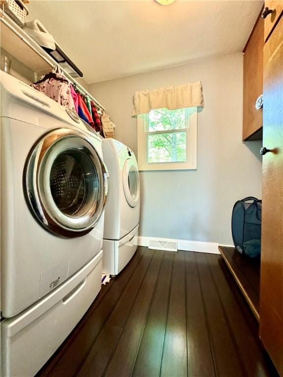 7 Overbrook Dr, Owego, NY 13732 - laundry room with washer and clothes dryer, dark wood-type flooring, and baseboards