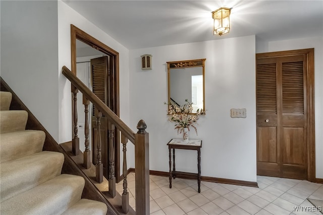 4640 Pine Mnr Unit W, Clarence, NY 14031 - stairs with baseboards and tile patterned floors