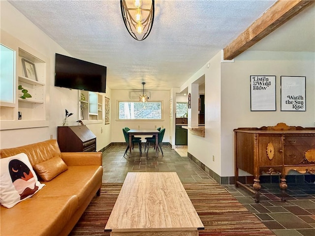 25 Woodside Ave, Oneonta-City, NY 13820 - living room featuring a textured ceiling and baseboards