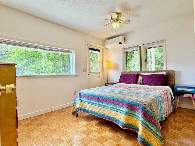 25 Woodside Ave, Oneonta-City, NY 13820 - bedroom with a wall mounted air conditioner, baseboards, and ceiling fan