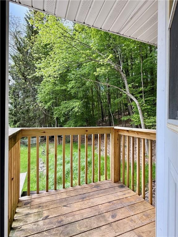 25 Woodside Ave, Oneonta-City, NY 13820 - wooden terrace featuring a yard