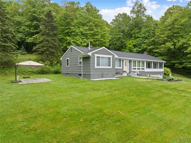11245 Bell Hill Rd, Deerfield, NY 13502 - view of front of property featuring a front lawn, a forest view, and a patio