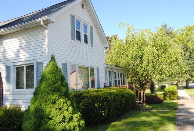 202 Birch St, Kane-Borough, PA 16735 - view of home's exterior with a lawn and a wooden deck