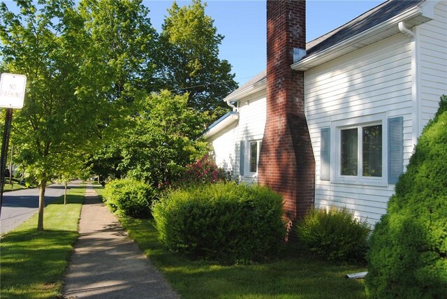 202 Birch St, Kane Boro, PA 16735 - view of home's exterior featuring a chimney