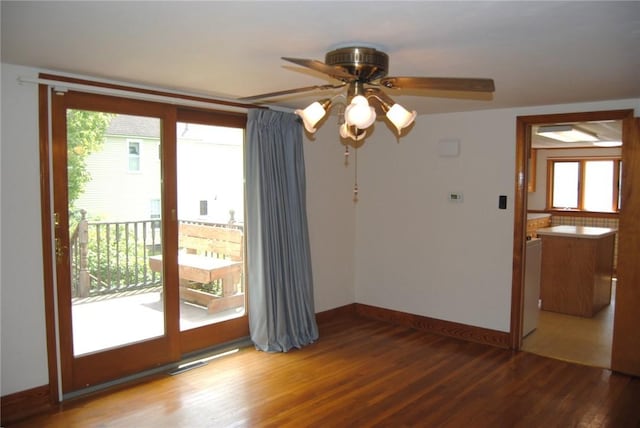 202 Birch St, Kane-Borough, PA 16735 - spare room featuring plenty of natural light, wood finished floors, a ceiling fan, and baseboards