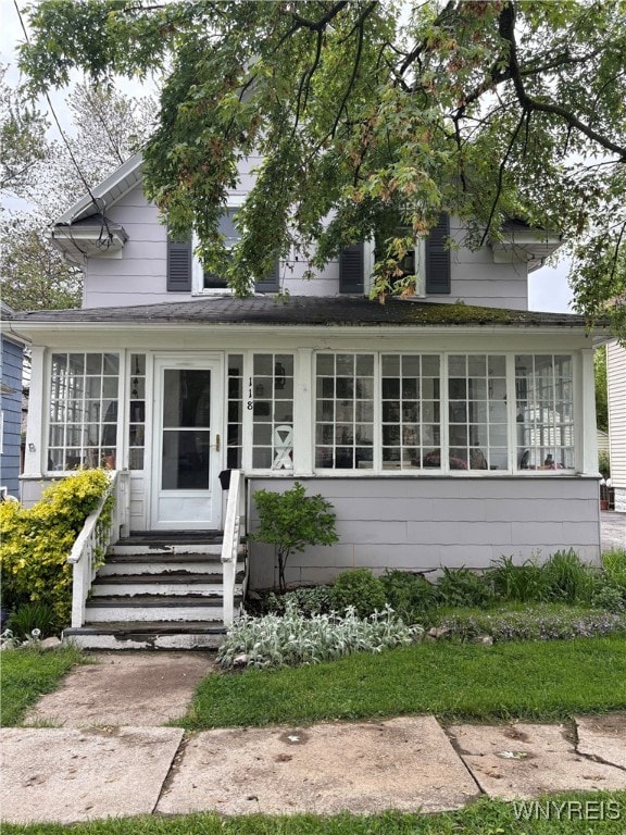 118 Zimmerman St, North Tonawanda, NY 14120 - view of front of home with a sunroom and entry steps
