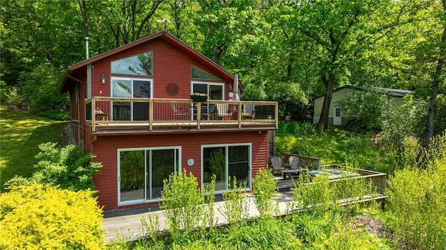 4255 Parish Hill Rd, Italy, NY 14512 - back of house featuring a balcony, a wooden deck, and a view of trees