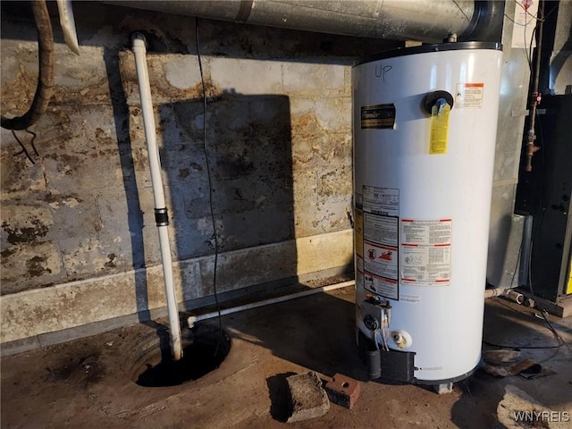 237 Tremont St, North Tonawanda, NY 14120 - utility room featuring gas water heater and drainage system