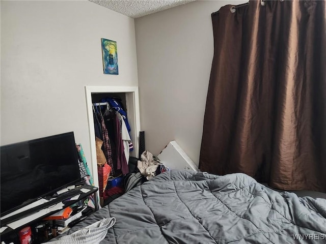 237 Tremont St, North Tonawanda, NY 14120 - bedroom featuring a textured ceiling