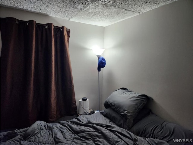 237 Tremont St, North Tonawanda, NY 14120 - bedroom with a textured ceiling