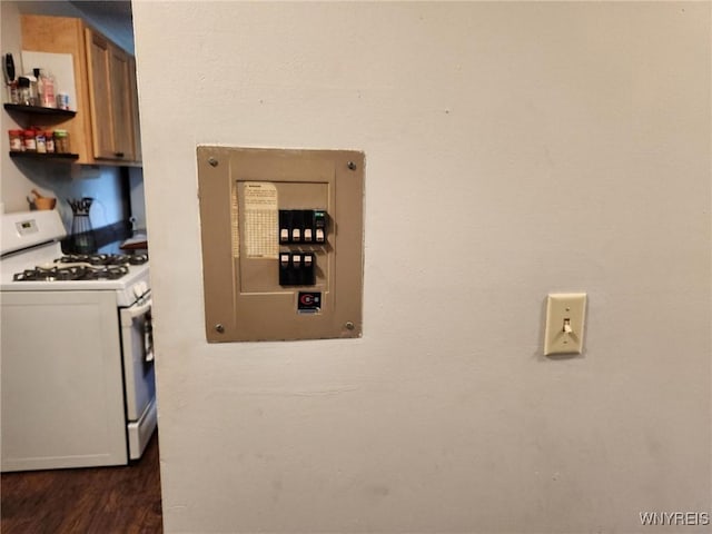237 Tremont St, North Tonawanda, NY 14120 - detailed view of gas range gas stove, wood finished floors, and electric panel