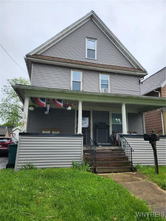 158 Keil St, North Tonawanda, NY 14120 - american foursquare style home featuring a porch