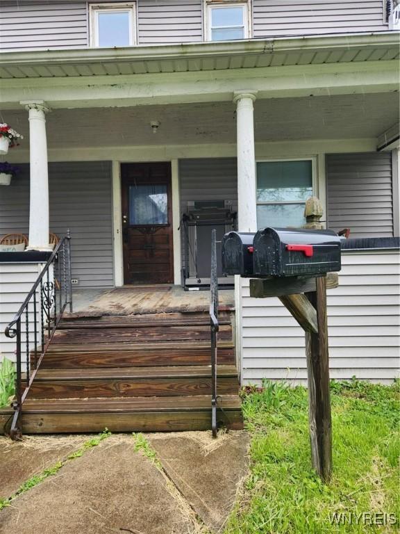 158 Keil St, North Tonawanda, NY 14120 - property entrance featuring a porch