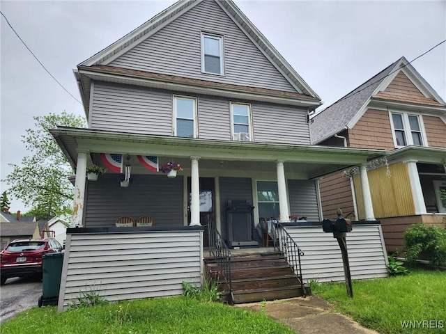158 Keil St, North Tonawanda, NY 14120 - american foursquare style home featuring covered porch